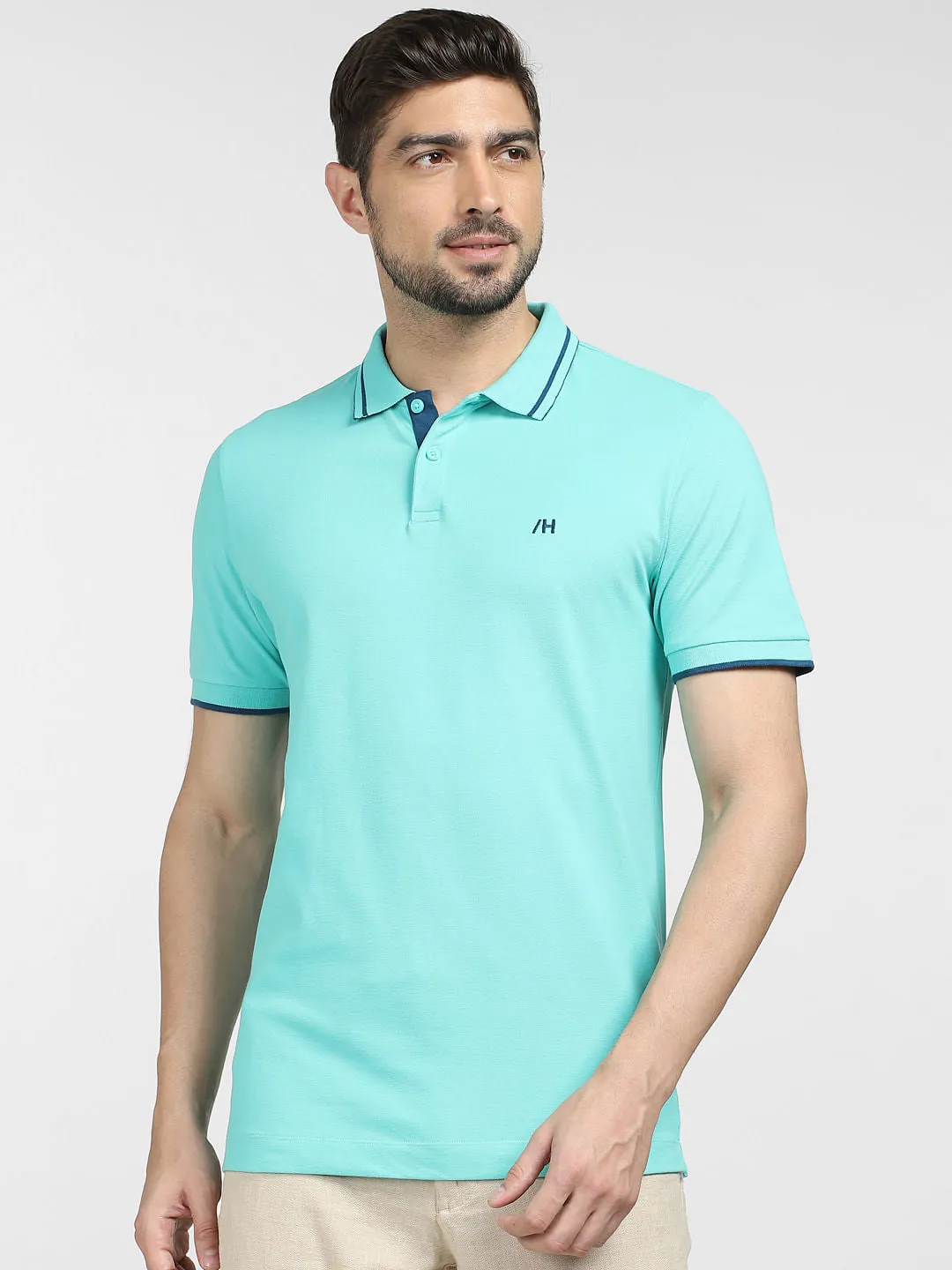 Blue Polo T-Shirt pria berkualitas tinggi dari BANK SLOT dengan detail kerah kontras