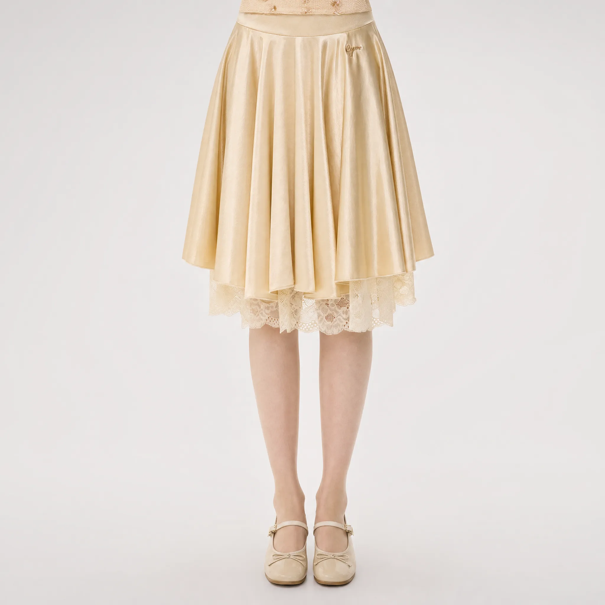 OXSLOT88 Lace Splice A-Line Skirt warna champagne gold dengan potongan midi anggun